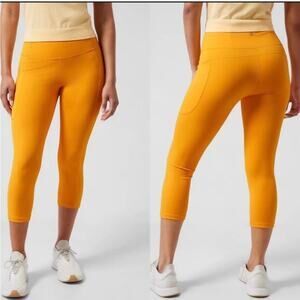 Athleta NEW Ultimate Stash II Capri Womens Size XS Radiant Sunrise Gold Yellow